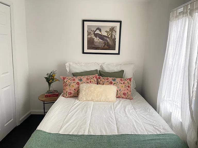 Bedroom with double bed and large double closet with shelves and hanging bar!