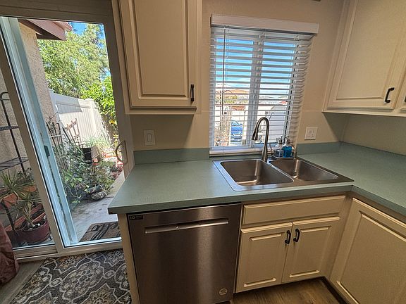 Kitchen with view to back patio/yard