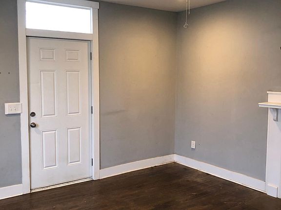 Living room with door to the huge wraparound deck.