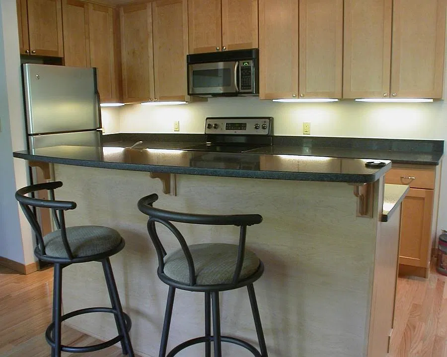 A different set of barstools is included.