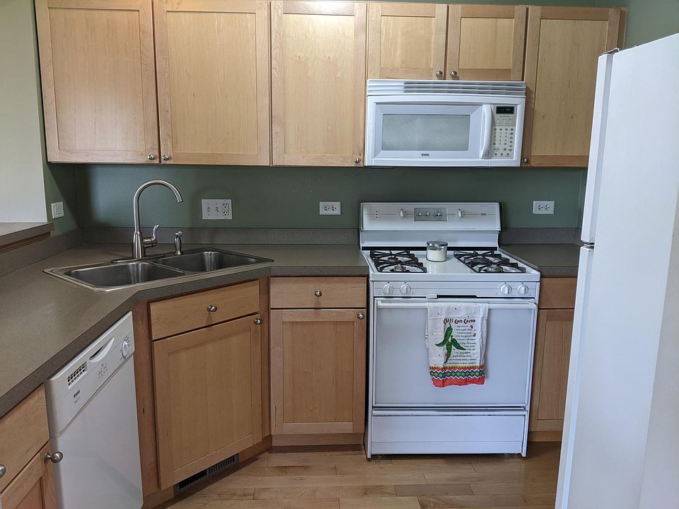 Kitchen- microwave, range, fridge & dishwasher.