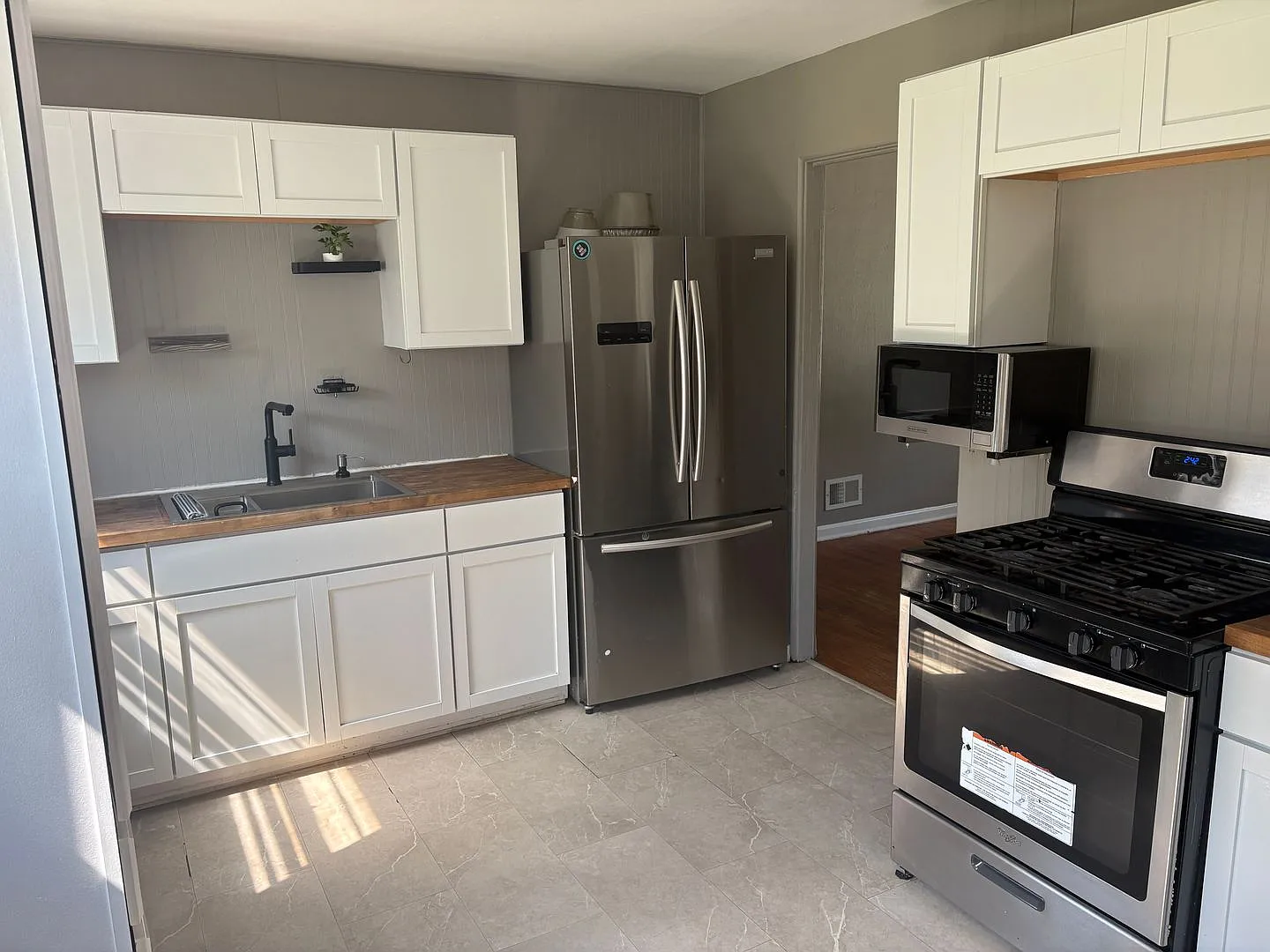 Home with finished basement and fenced in yard — Photo 4