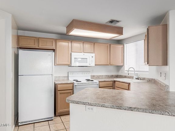 5th image of 10401 N 52nd St Unit 114
