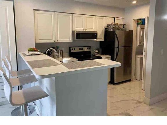 2nd image of 12118 Saint Andrews Pl APT 208