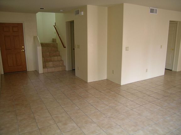 living room and stairs up to all bedrooms. Powder room downstairs