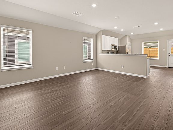Family Room to Kitchen and Dining Area