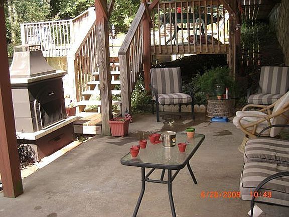 covered patio w/ outside fireplace