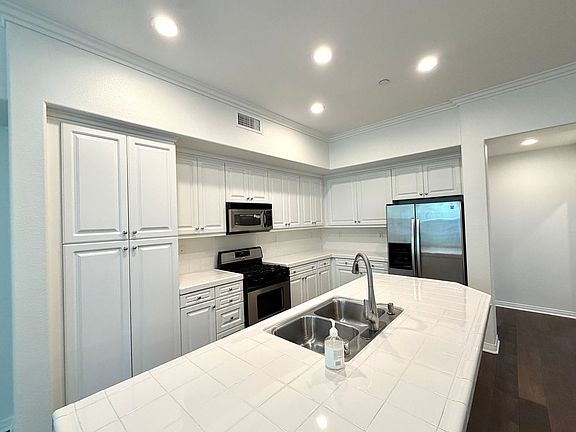2nd image of 628 W 1st St