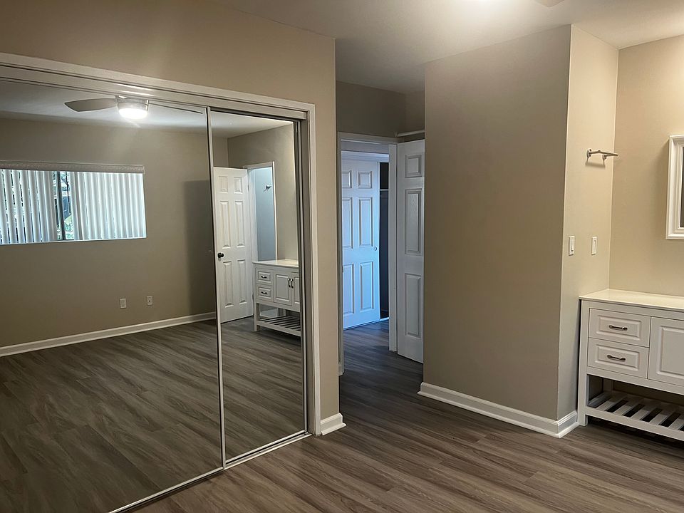 master bedroom with vanity & second bathroom with walk in closet