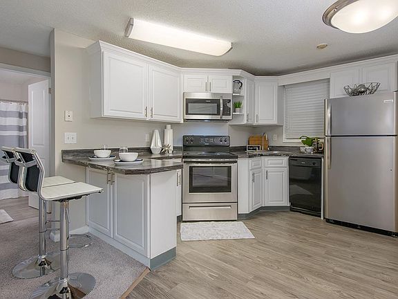 Updated kitchens with stainless steel appliances are available.