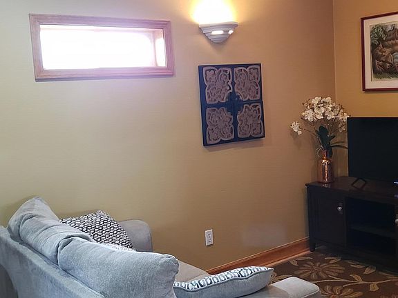 Living room area with new TV
