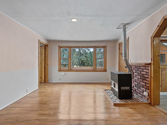 Open living area with natural light and warm wood accents