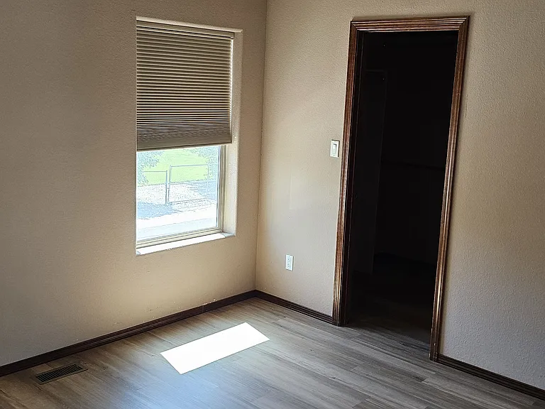Upstairs bedroom 1 with a walk-in closet.