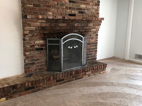 Family Room w/ WoodFireplace