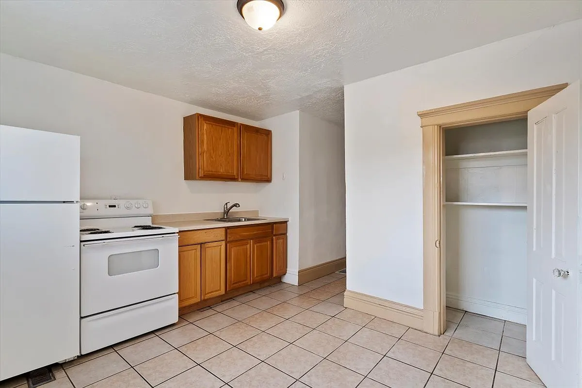 2557 Adams Ave - 2 — Photo 1