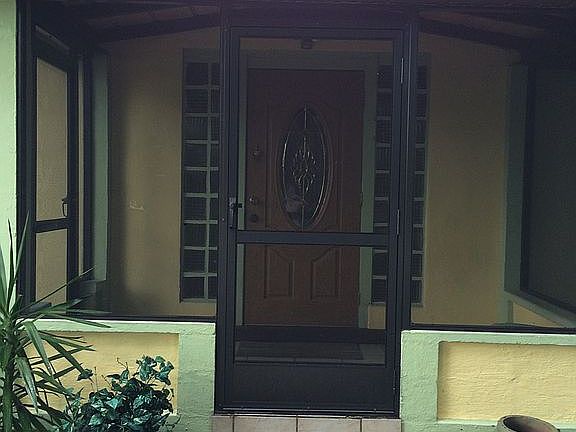 Cottage front door screened