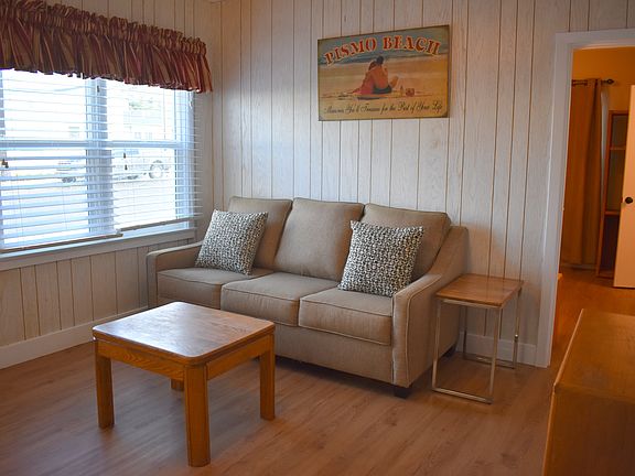 Living room, this door leads to front bedroom which has the 1/2 bath