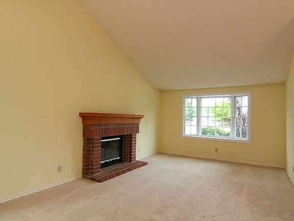 Fireplace and Vaulted Ceilings in Living Room