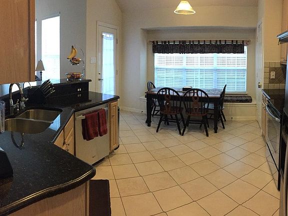 Granite, Tile, and Stainless Steel Appliances