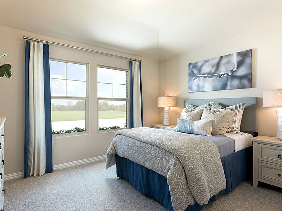 Tons of natural light fills the front bedroom