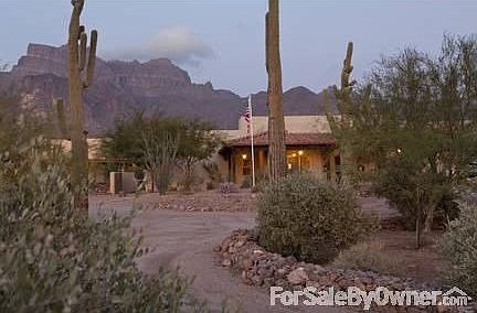 Front Elevation
						:
						Drive leading up to the home.