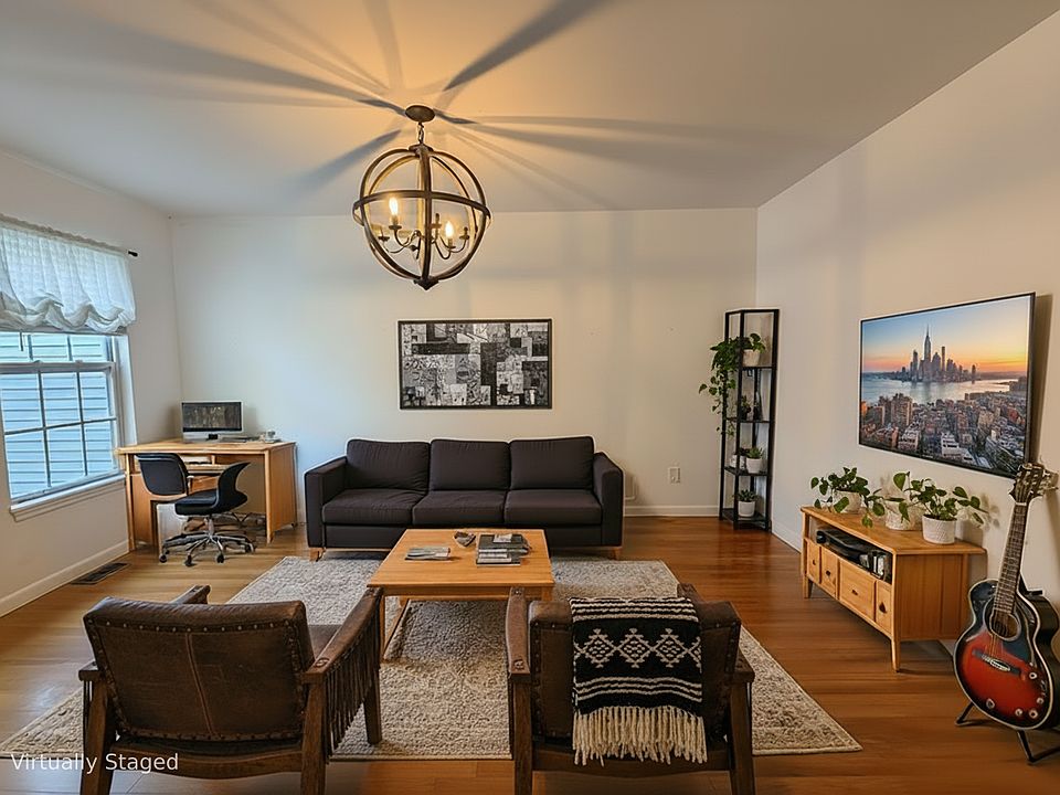 Beautiful oversized living room with ample space for WFH office.