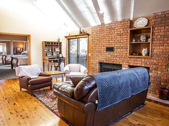 Upstairs living room. Wood burning fireplace.