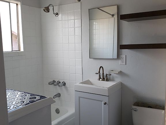Bathroom with built ins and floating shelves