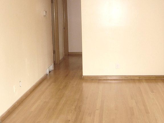 Living room/dining room. Hall to 3 bedrooms, and bathroom
Hardwood floors just refinished. 
New window coverings.