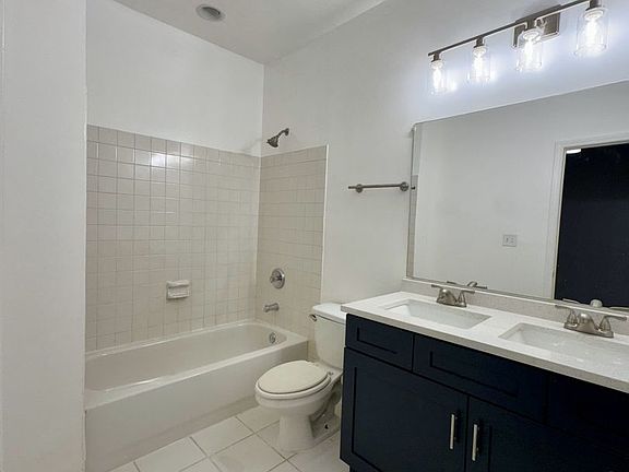4th image of 2456 E 74th Pl #1