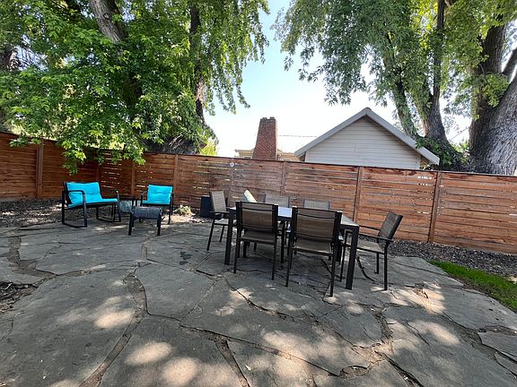 New outdoor dining table and morning coffee seating.