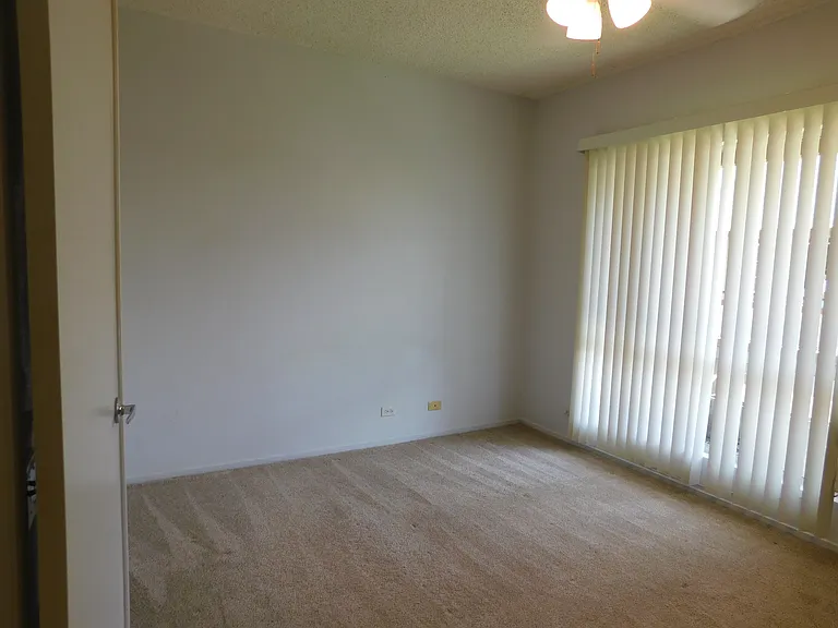 Bedroom #1. Ceiling fan and window a/c