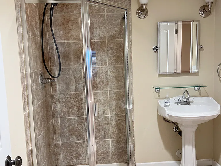 Guest Bathroom with walk-in shower @ finished basement