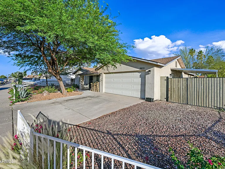 5833 W John Cabot Rd — Photo 2