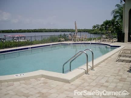 POOL : OVERLOOKS DOCK AND THE BAY OFF THE INDIAN RIVER