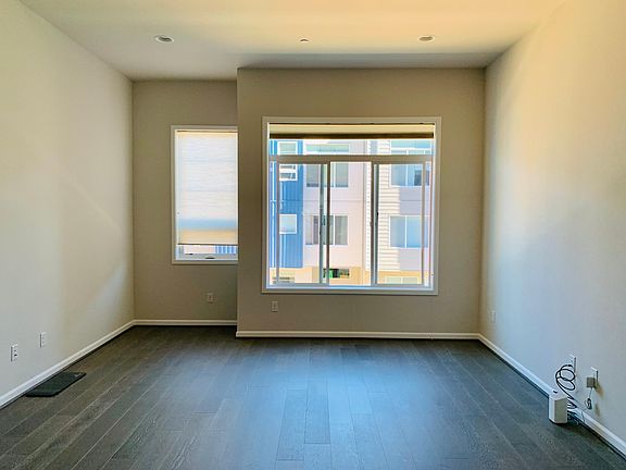 Living room with 12+ft ceiling