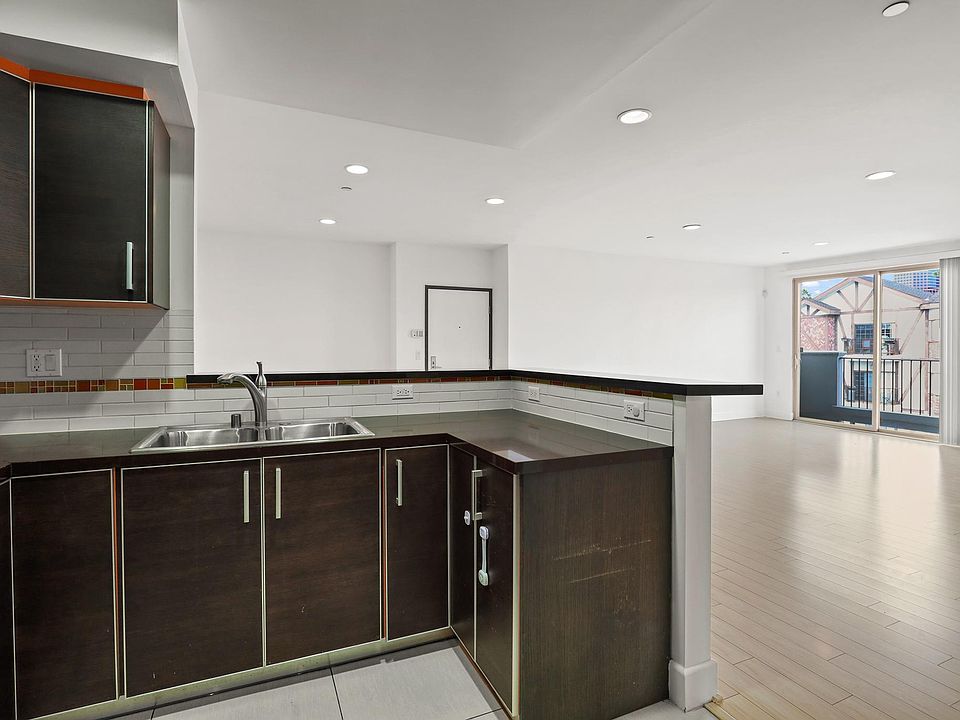 Open-Concept Kitchen, Dining, and Living Room Areas