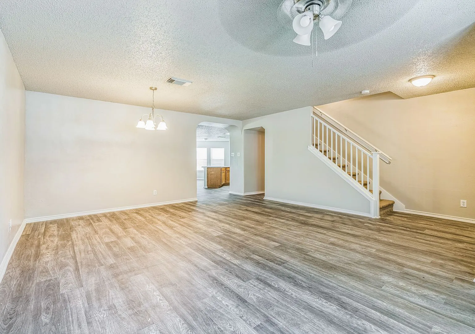 Spacious 4-Bedroom Home with Open Floor Plan & Brick Fireplace — Photo 3