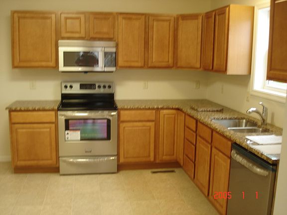 Stainless Steel appliances under cabinet microwave garbage d