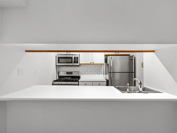 4th image of 393 W 49th St APT 2S