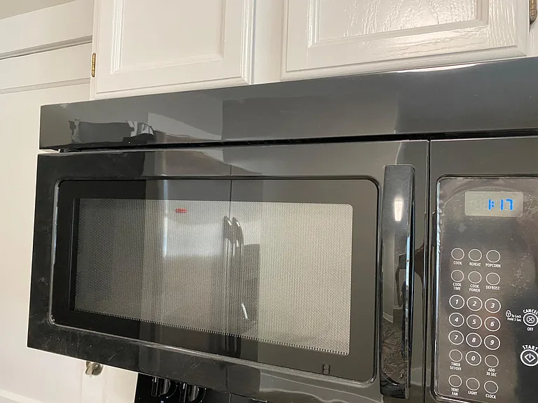 ALL NEW appliances in spacious, light-flooded kitchen.