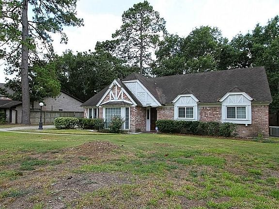 This home sits on a large lot, mature trees, sprinkler system in the front.
