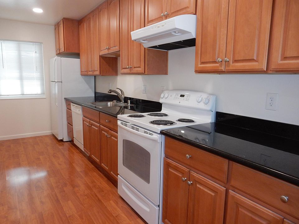 Kitchen with dishwasher and granite counter tops