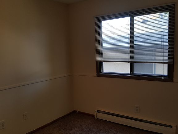 Bedroom 2 with full size closet. Room is approx 10x10