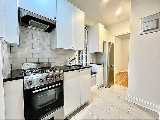 1st image of 299 E 8th St APT 18