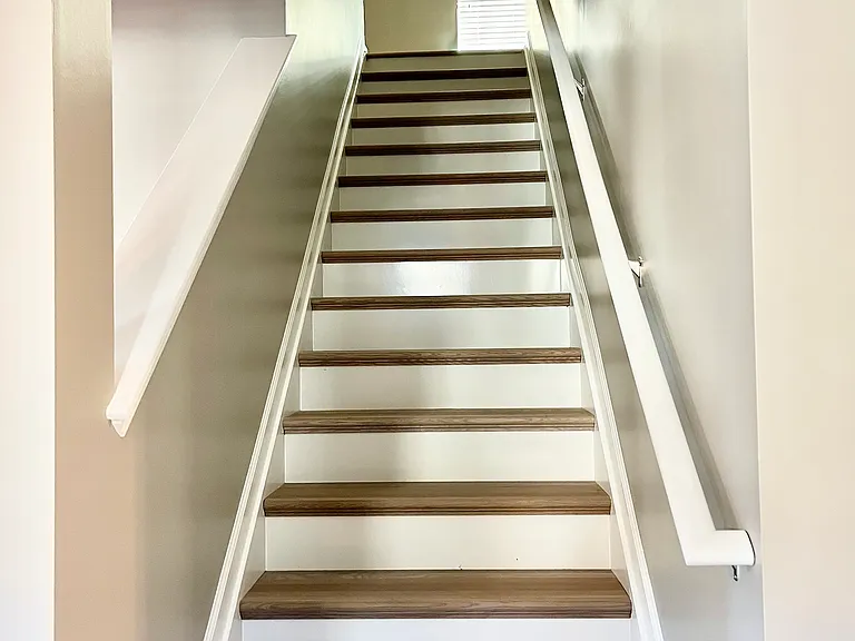 Staircase off family room
