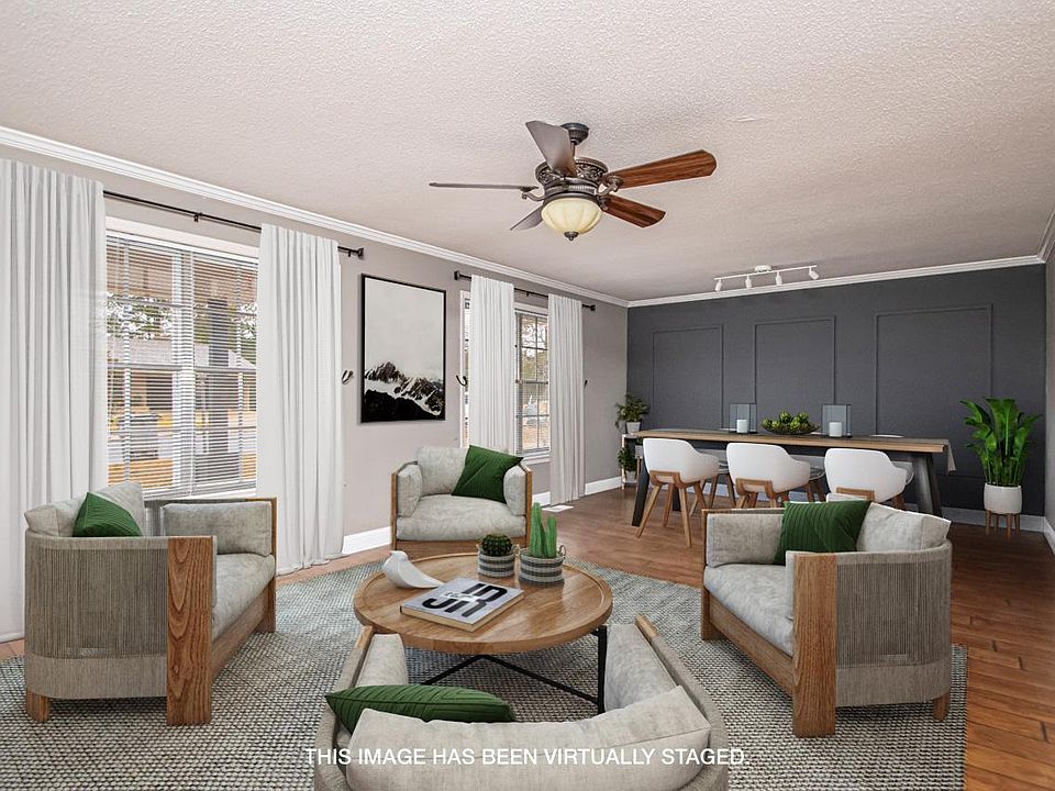 upstairs living room/dining room virtually staged