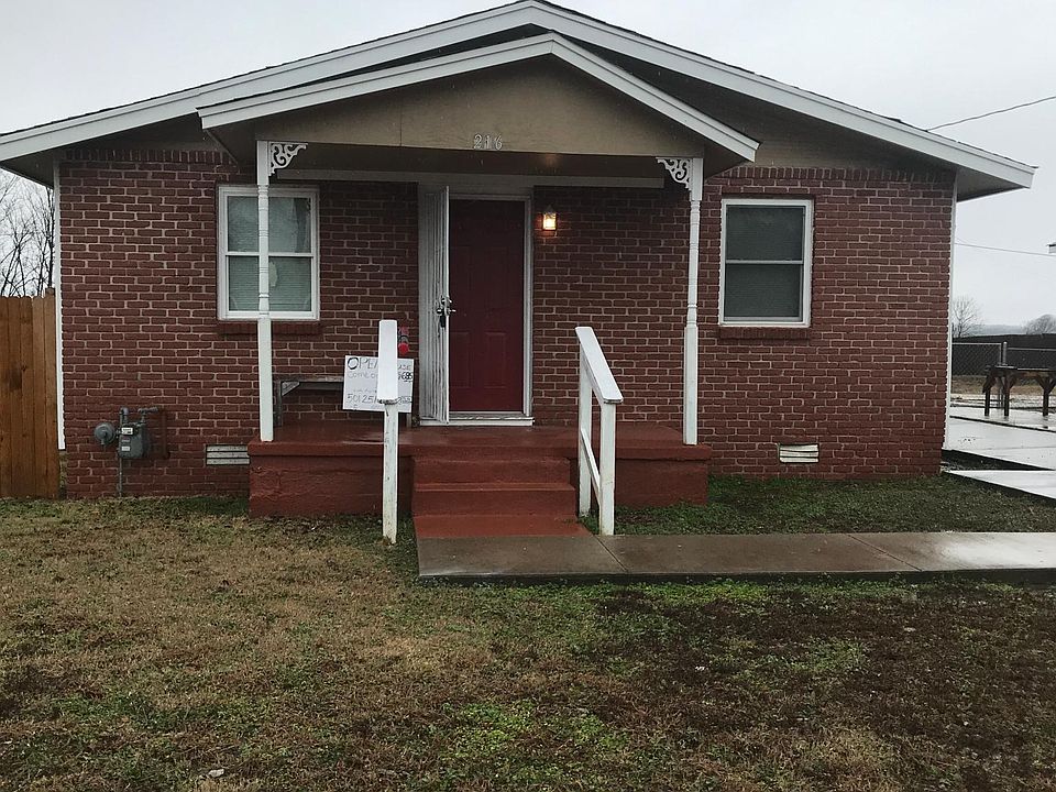 Even in the rain this home invites you in!