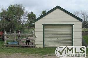 Dog Kennel w/ Doggy Door to Garage