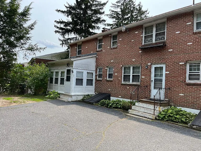 Rear of house with parking